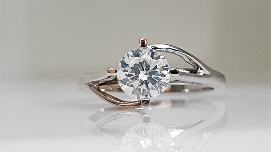 0.71 Ct Round Diamond Made Of 18 Kt White Gold Engagement Ring
